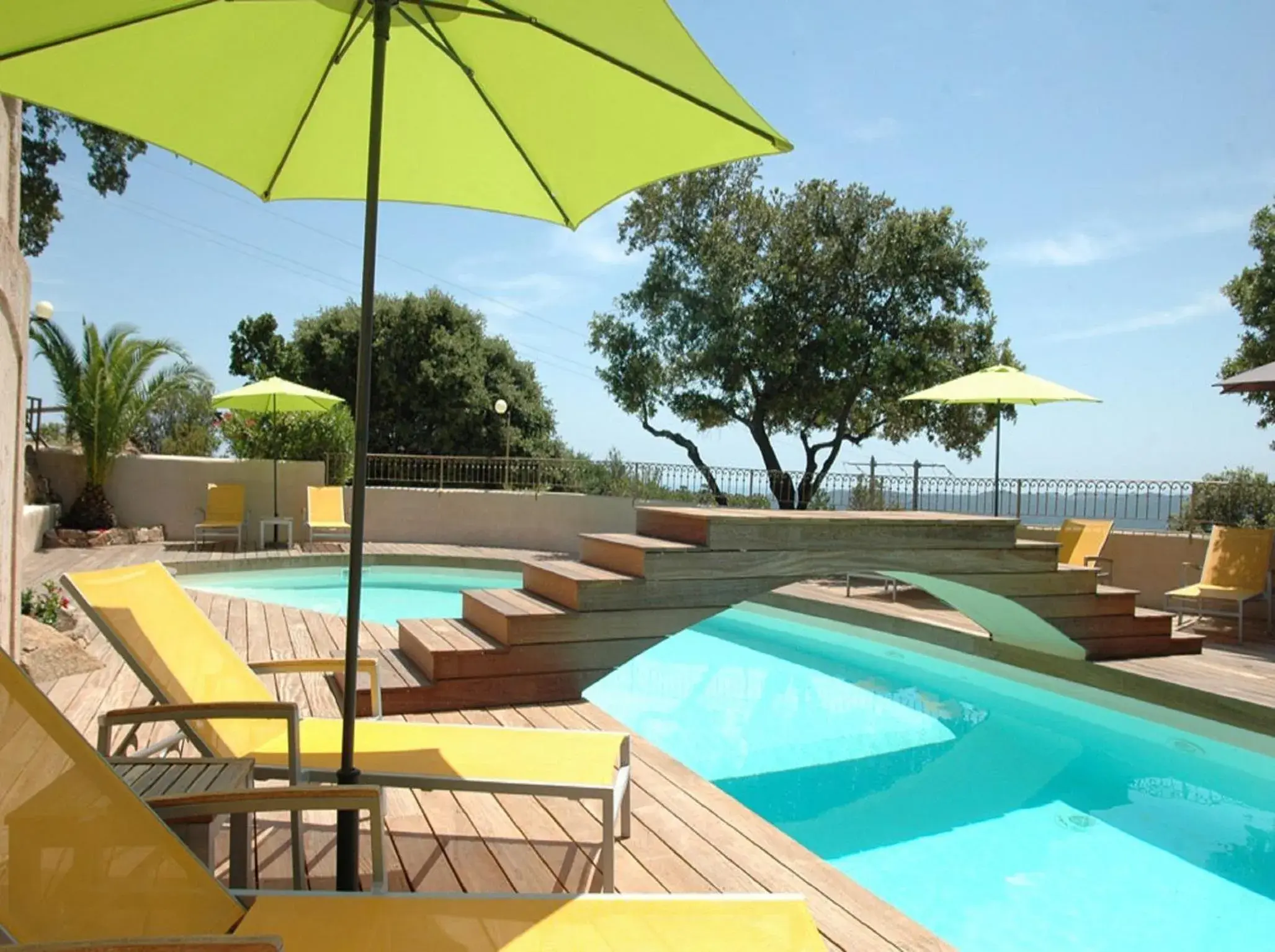 Swimming pool in Bungalows Du Maquis